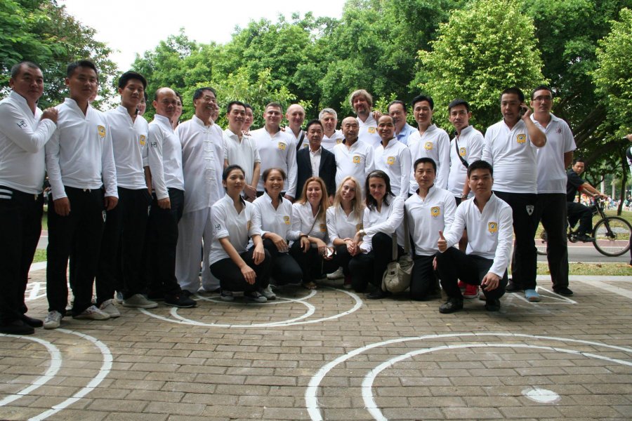 Famous baguazhang master Pan Xuezhi, Mu Yuchun and his students. 2014 Shenzhen. China.